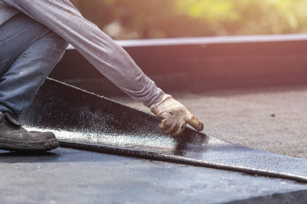 Professional Basement Waterproofing technician working in Urbana, MD